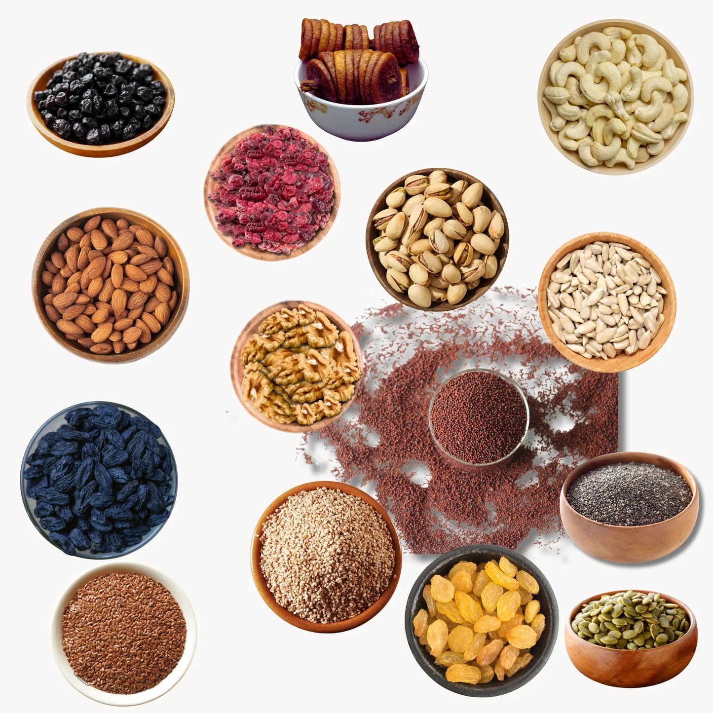 Assorted nuts, seeds, and dried fruits in small bowls on a white background