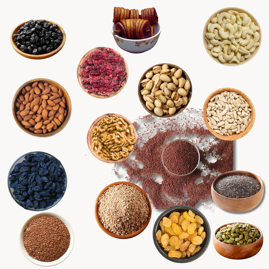 Assorted nuts, seeds, and dried fruits in small bowls on a white background